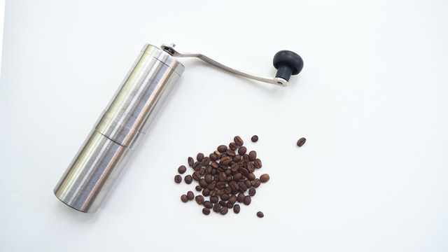 Manual metal coffee grinders are an easy way to grind coffee beans